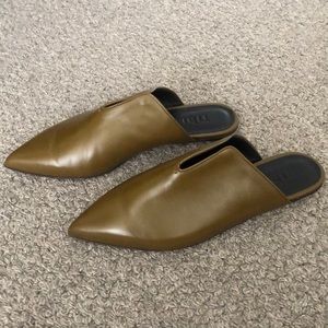 A Pair of Tibi Leather Slides